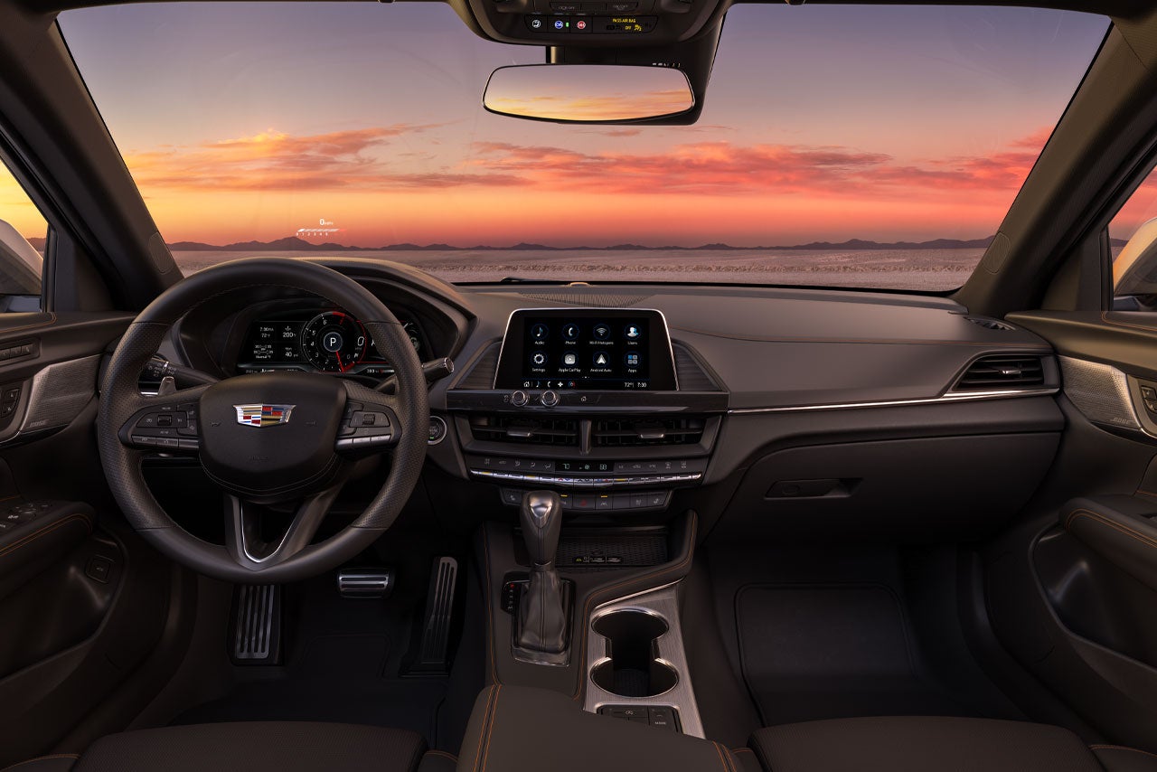 Driver's View of the 2026 CT4 Sleek Infotainment System and Steering Wheel